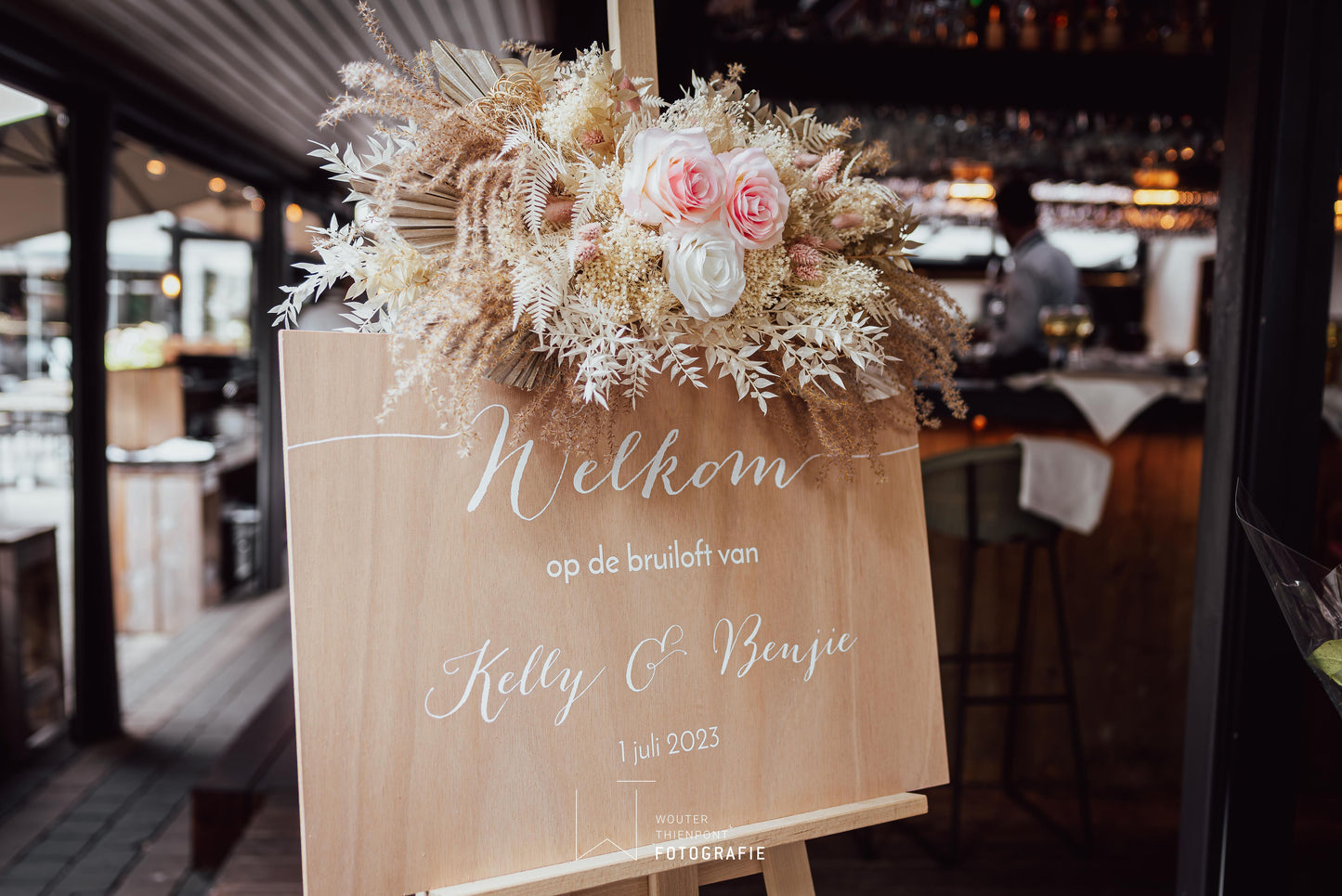 Bloemstuk welkomstbord