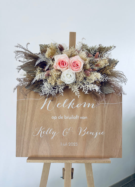 Bloemstuk welkomstbord