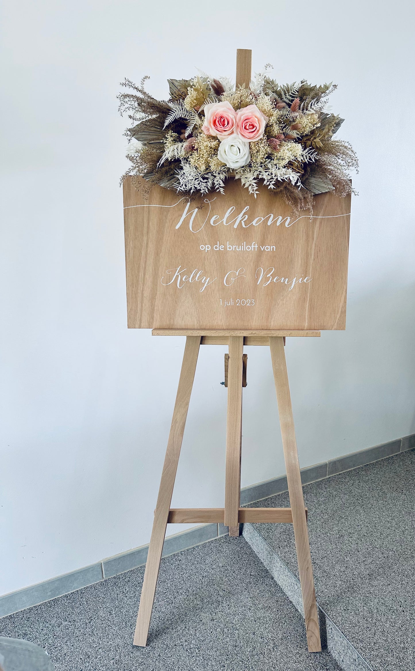 Bloemstuk welkomstbord